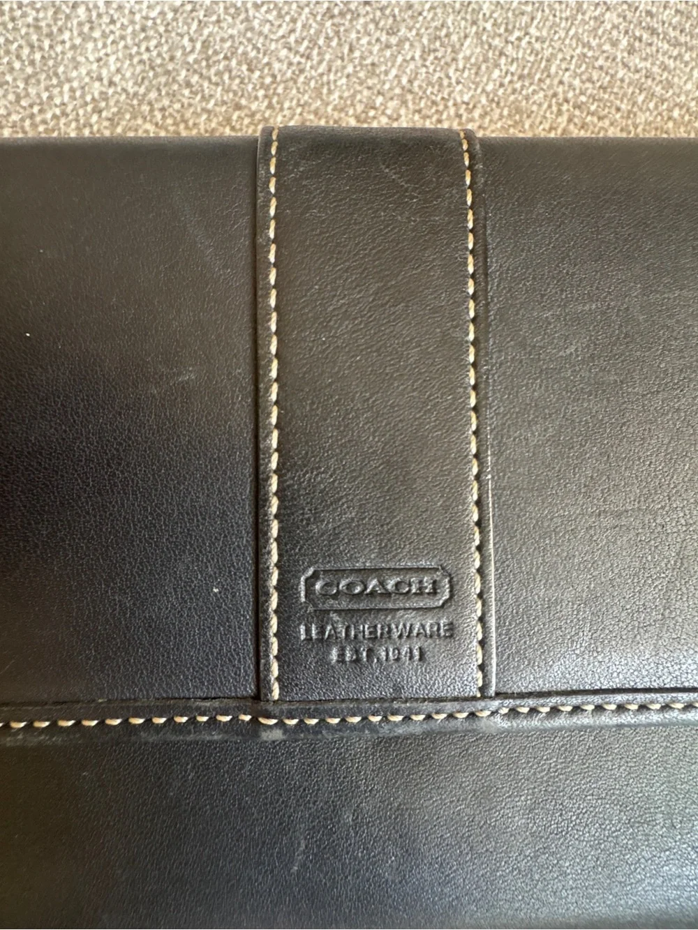 Coach features brand